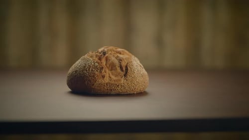 Fresh Baked Organic Bread On Wooden Table Background