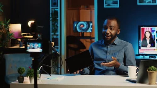 Man Recording Presentation with Tablet and Microphone