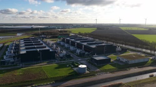 Aerial drone video of a large-scale data center in Middenmeer, The Netherlands, highlighting redunda