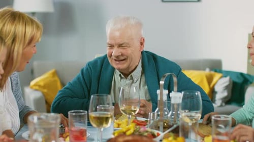 Family Sharing Meal Together Indoors at Home