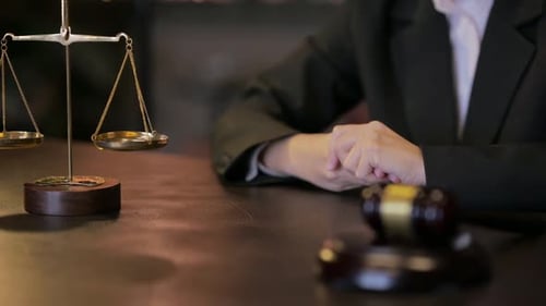 Close up of Anxious Hand Gesture in Courtroom