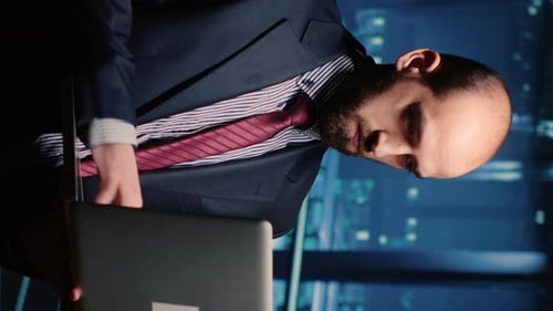 Professional At Work With Laptop At Night