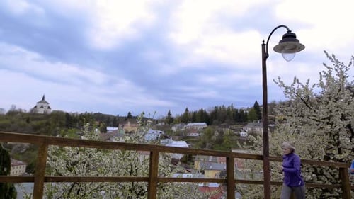 Group Of Seniors Running Outdoors In The Old Town.