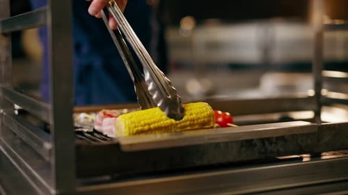 in Japanese Restaurant the Chef Grills Various Vegetables As a Side Dish for Fish
