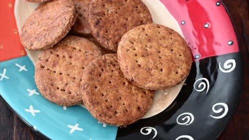 Close-Up of Round Cookies on Colorful Plate
