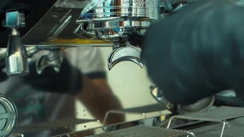 Barista Preparing Espresso Drink at a Cafe