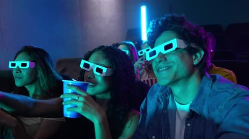 Friends Enjoying a 3d Movie at the Cinema in Slow Motion