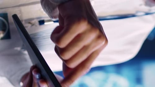 Vertical Video Specialist Doing AI Simulation on Tablet