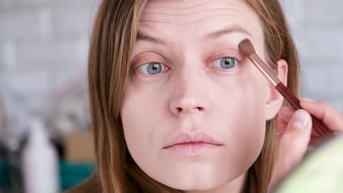Woman Receiving Makeup Applied Close Up