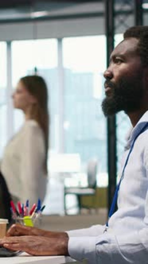 Vertical Video System Administrator in Office Using PC Automating Repetitive Tasks with AI