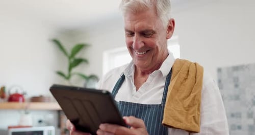 Man, tablet and laughing in kitchen with cooking dinner in apron or healthy nutrition or funny post