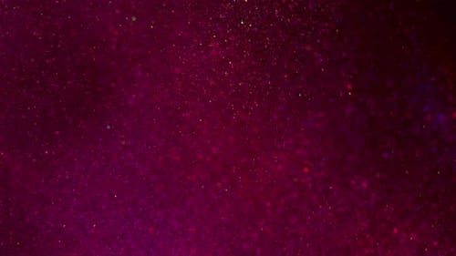 Glittering Magenta Background with Shimmering Particle Effects
