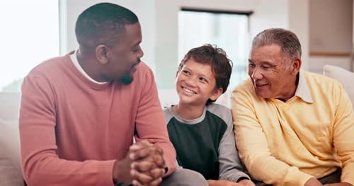 Three Family Members Smiling Indoors