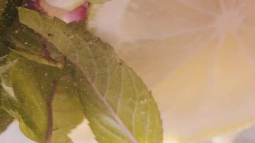 Refreshing Drink with Lemon, Mint and Pink Ice