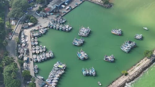 Drone Orbiting Around Fishing Boats In Marina 2