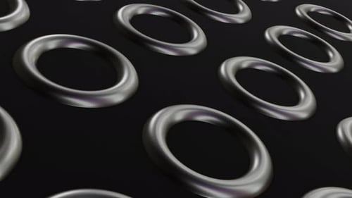 Animación perfecta de círculos negros brillantes sobre fondo oscuro