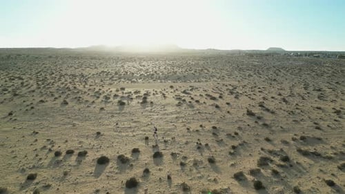 Aerial view of sandy desert dunes at sunset, Spain.