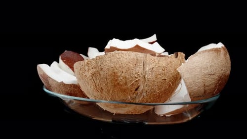 Coconut Slices and Shell Pieces in Bowl