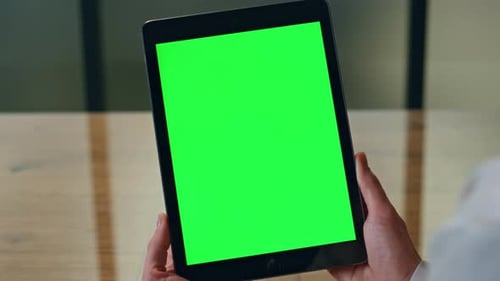 Hands Holding Tablet with Chroma Key Screen