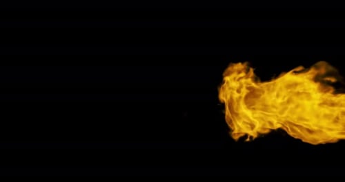 breathtaking sight of an impressive fireball as it gracefully dances through the frame in slow motio