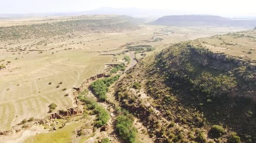 Magical Drone of Arid, Eroded Dry River in Drought African Landscape