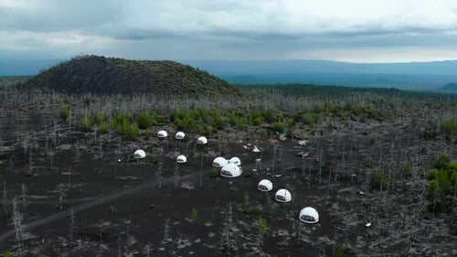 Glamping Dome Camp Aerial View in Volcanic Landscape Media