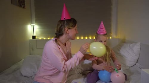 Mother and Child Blow Up Birthday Balloons Indoors