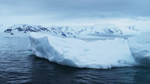 Majestic Glaciers and Massive Floating Icebergs Across the Antarctic Horizon