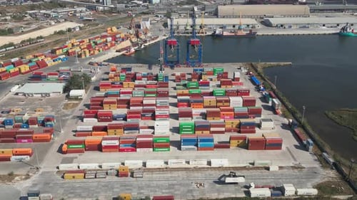 Aerial View of a Container Terminal at the Port Where Massive Containers Await Their Journey