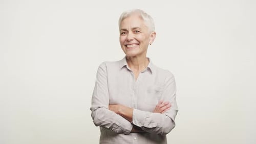 Smiling Mature Woman Posing Confidently Indoors