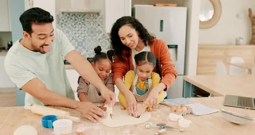 Happy Family Baking Cookies in Bright Kitchen