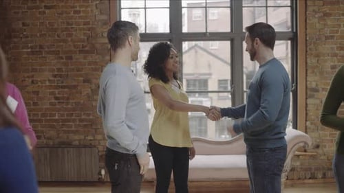 Networking Meeting: Adults Introduce Themselves in Office
