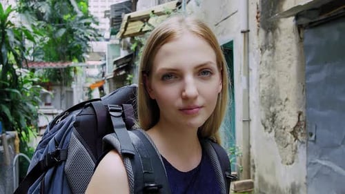 Portrait of Beautiful Backpacker Tourist Girl Smiling at Camera on Bangkok Asian