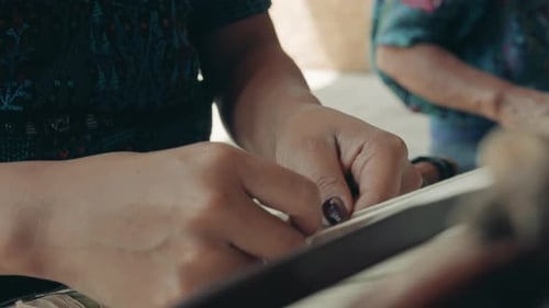 Loom And Female Hands At Work In Guatemala, Central America - closeup