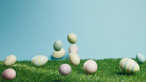 Easter Eggs Fall on Green Grass