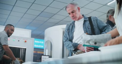 Airport Security Checkpoint With Travelers and Luggage