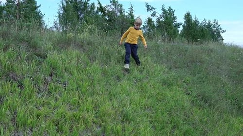 Joyful Child Running Happily Through a Lush Vibrant Green Field on a Sunny Day A Joyful Child is