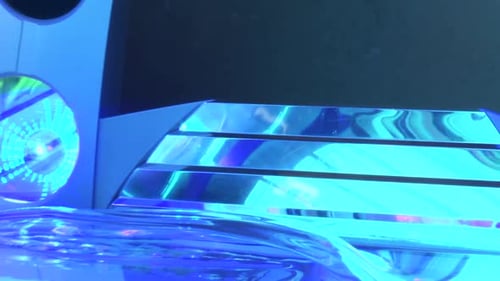 Tanning Bed Illuminated with Blue Lights
