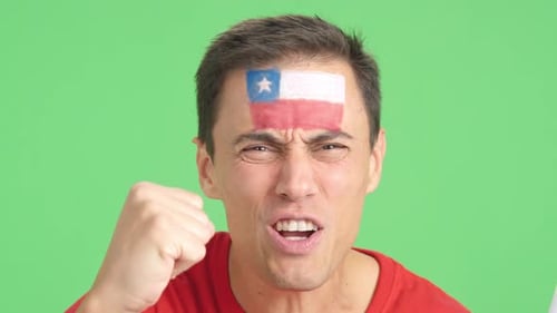 Close Up of a Man Supporting Chilean Team