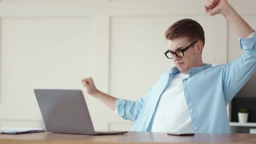 Tired of Sedentary Work Guy Stretching Body at Workplace