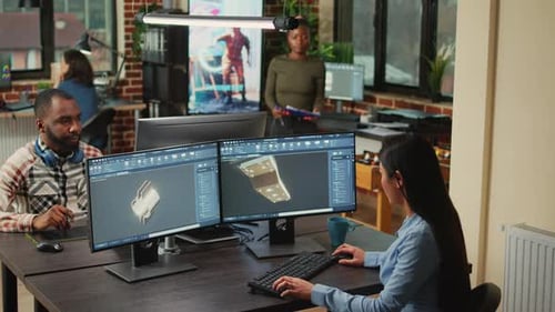 Creative Agency Diverse Team Editing Video Footage Using Color Grading