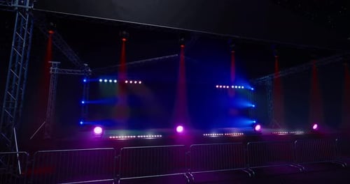 Dynamic Concert Stage with Moving Spotlight Beams and Strobe Lights