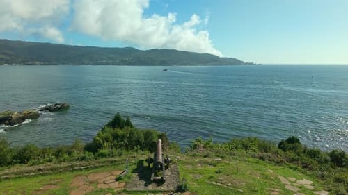 Aerial in historic cannon at Mancera Fortress point toward Corral bay Chile