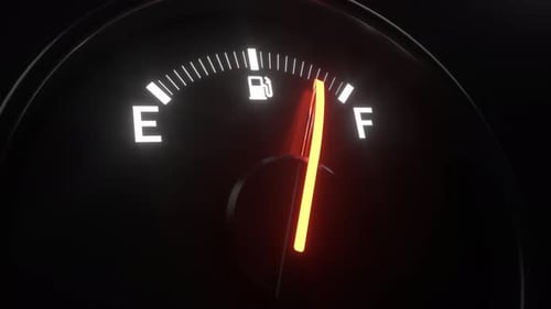 Fuel gauge with empty and full indication.Gasoline meter with illuminated needle car dashboard,macro