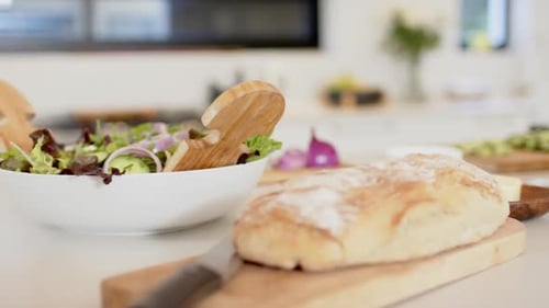 Fresh Bread and Garden Salad in a Modern Kitchen