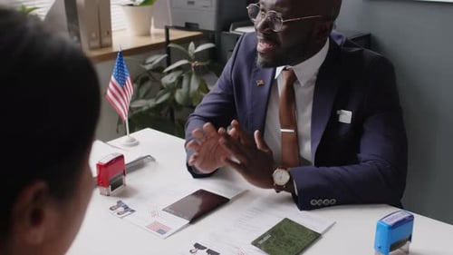 Government Official Interviewing Subject in Office