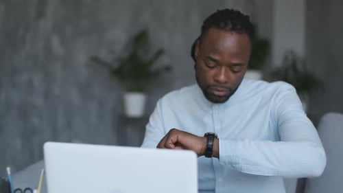 Man on Video Call in Living Room