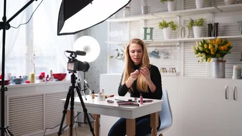 Beauty Blogger Woman Filming Daily Makeup Routine Tutorial on Camera Influencer Blonde Female Live