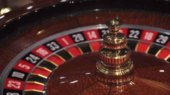 Roulette wheel in casino and ball on zero number, lose or bad luck ...