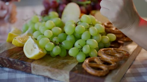 Closeup View of Delicious and Fresh Appetizers on a Wooden Plate
